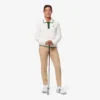 Camisola de golfe elástica com gola polo para mulher