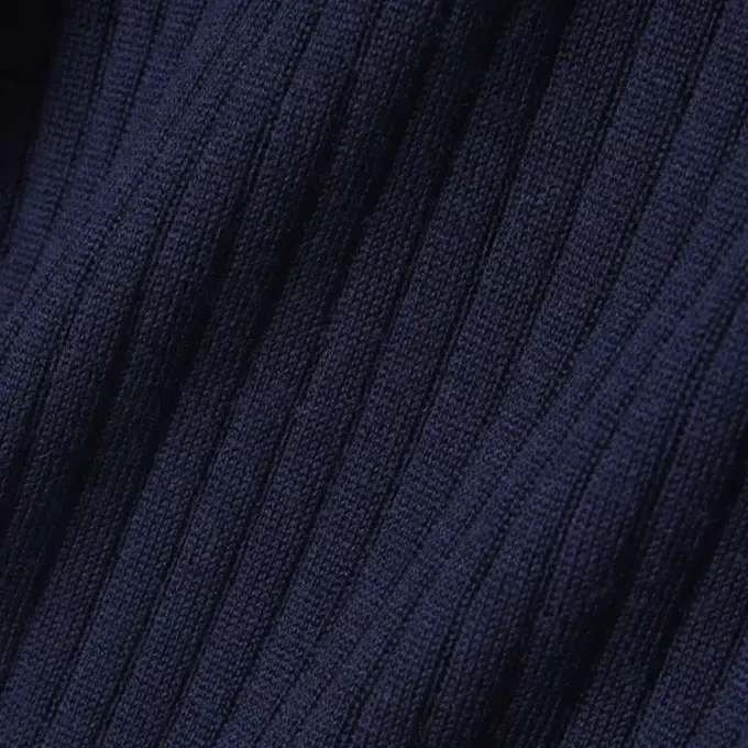 Camisola de lã merino com gola polo em malha canelada 3D