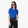 Camisola de malha canelada com gola polo para mulher