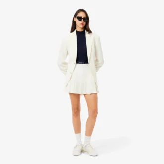 Camisola de malha canelada de lã merino com gola alta para mulher