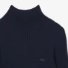 Camisola de malha canelada de lã merino com gola alta para mulher