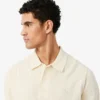 Camisola de malha canelada fluida com gola polo