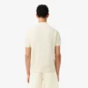 Camisola de malha canelada fluida com gola polo