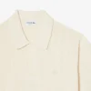Camisola de malha canelada fluida com gola polo