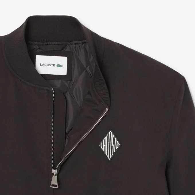 Casaco bomber retro com emblema e repelente de água