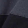 Casaco com capuz e fecho em blocos de cor