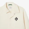 Casaco com emblema retro fabricado em França