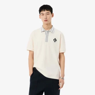 Fabricado em França Polo com emblema de corte clássico