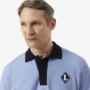 Fabricado em França Polo com emblema de corte clássico