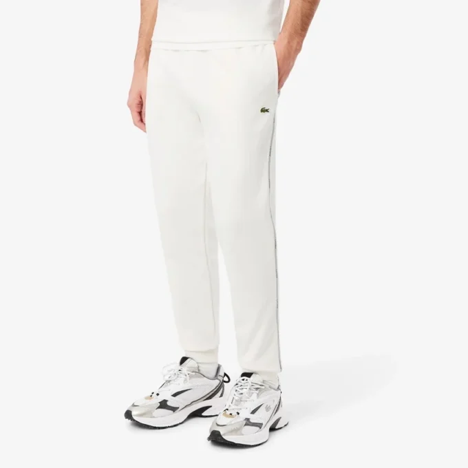Fatos De Treino com riscas e logótipo