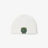 Gorro unissexo de lã com canelado e emblema