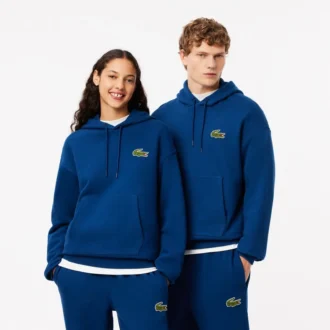 Hoodie unissexo de corte largo com detalhe de emblema