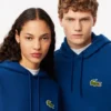Hoodie unissexo de corte largo com detalhe de emblema