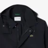 Parka com capuz repelente de água de comprimento médio para homem