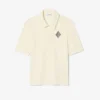 Polo bordada de corte justo