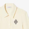 Polo bordada de corte justo
