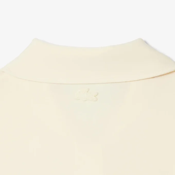 Polo bordada de corte justo