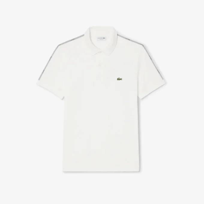 Polo com riscas e logótipo, corte regular