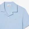 Polo de corte clássico com textura