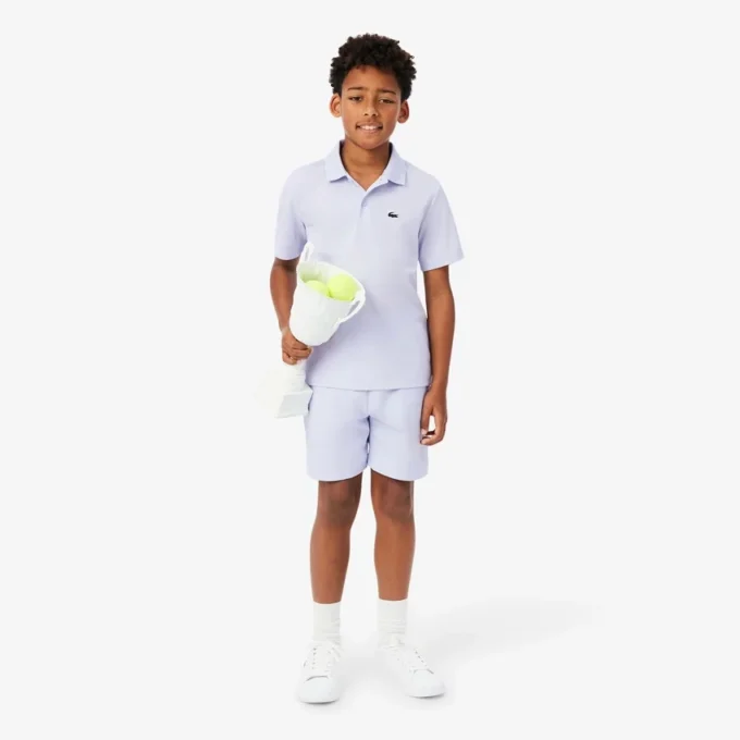 Polo de desporto Ultra Dry em jersey para rapaz