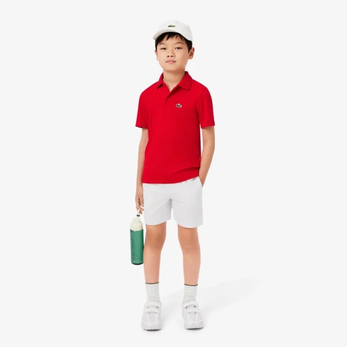 Polo de desporto Ultra Dry em jersey para rapaz