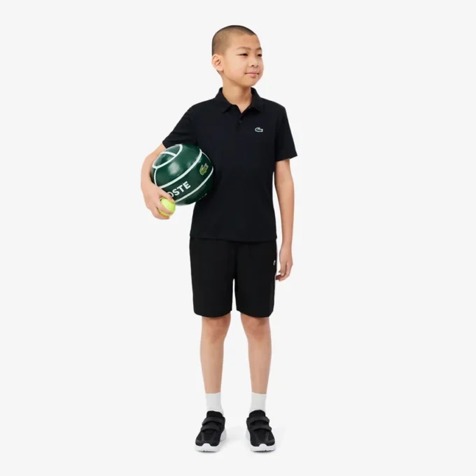 Polo de desporto Ultra Dry em jersey para rapaz