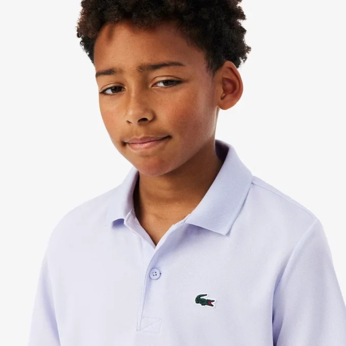 Polo de desporto Ultra Dry em jersey para rapaz