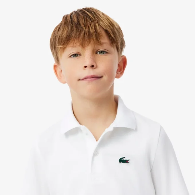 Polo de desporto Ultra Dry em jersey para rapaz