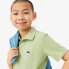 Polo de desporto Ultra Dry em jersey para rapaz