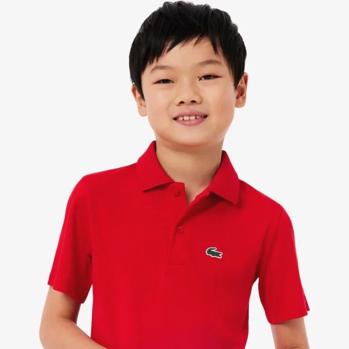 Polo de desporto Ultra Dry em jersey para rapaz