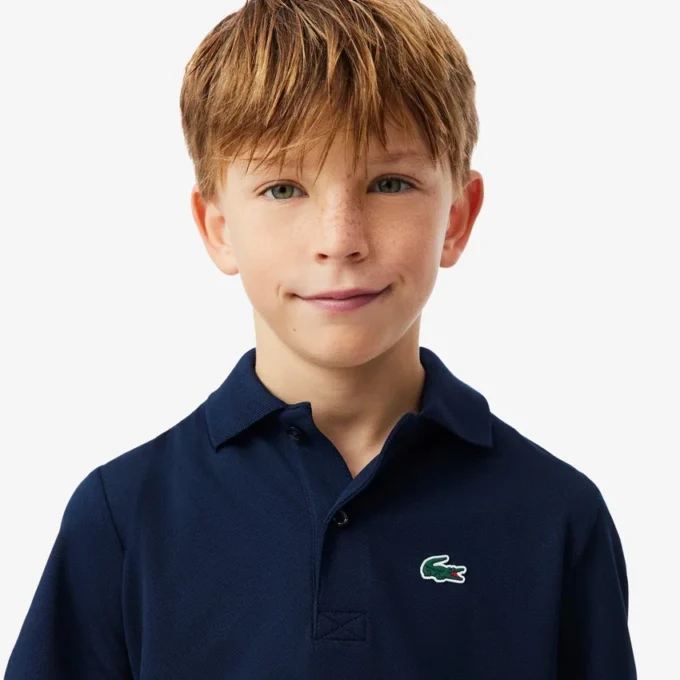 Polo de desporto Ultra Dry em jersey para rapaz