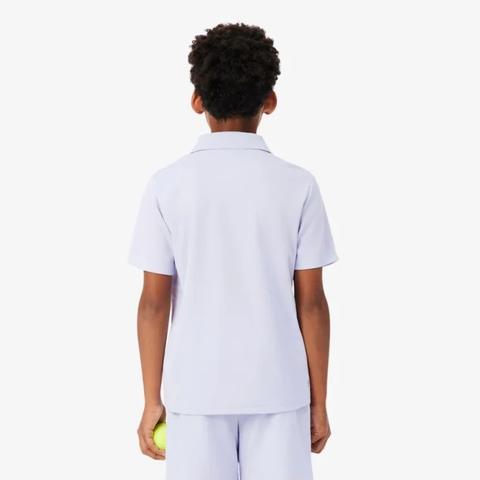 Polo de desporto Ultra Dry em jersey para rapaz