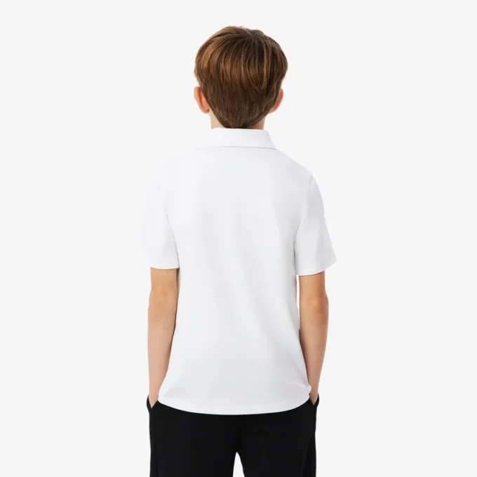 Polo de desporto Ultra Dry em jersey para rapaz