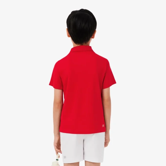 Polo de desporto Ultra Dry em jersey para rapaz
