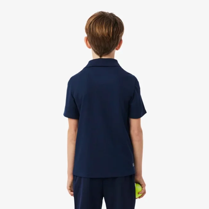 Polo de desporto Ultra Dry em jersey para rapaz