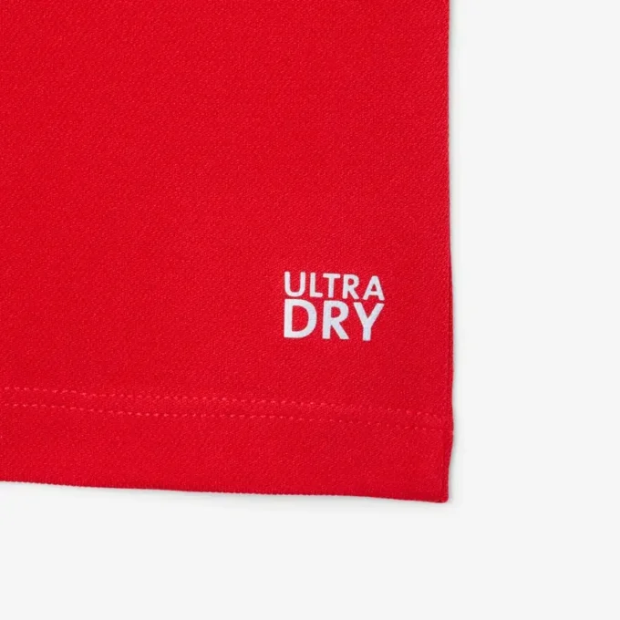 Polo de desporto Ultra Dry em jersey para rapaz