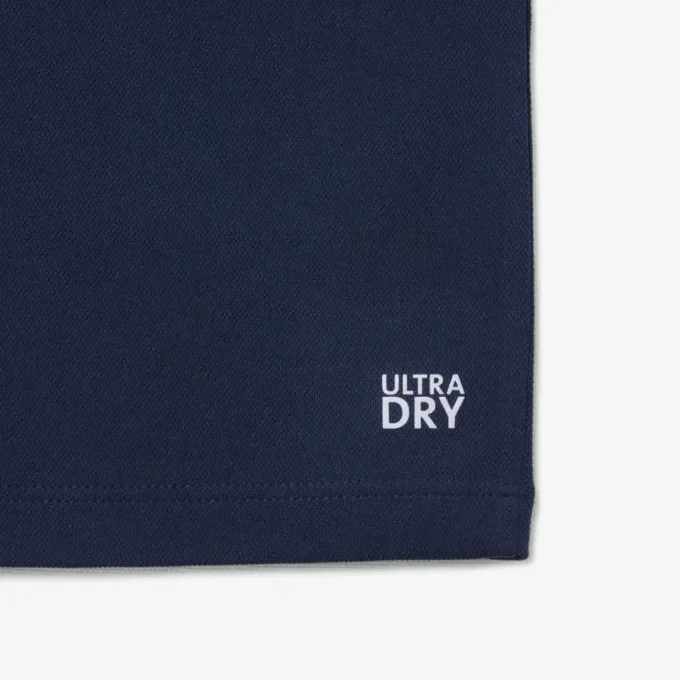 Polo de desporto Ultra Dry em jersey para rapaz