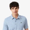 Polo de golfe com riscas Ultra Dry de corte regular