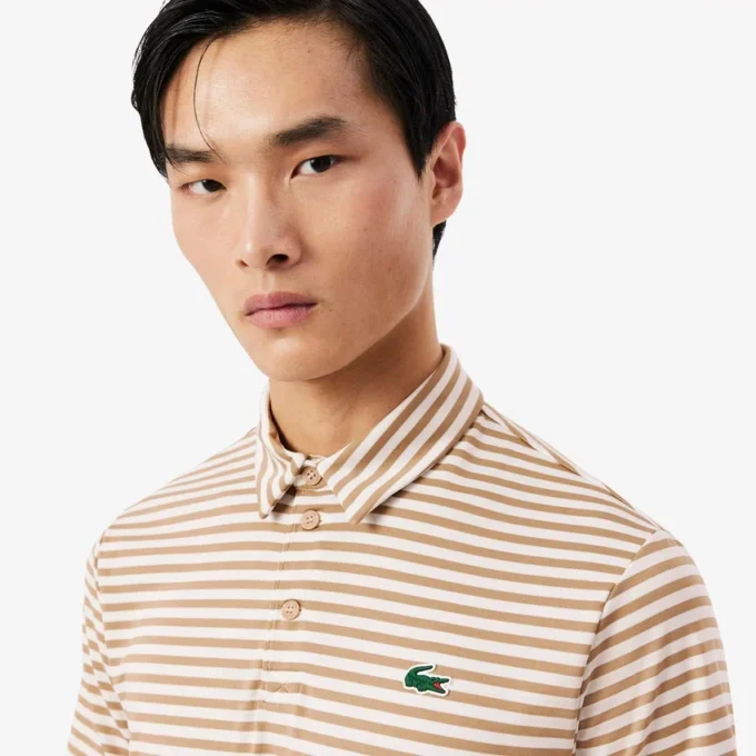 Polo de golfe com riscas Ultra Dry de corte regular