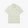 Polo de golfe com riscas Ultra Dry de corte regular