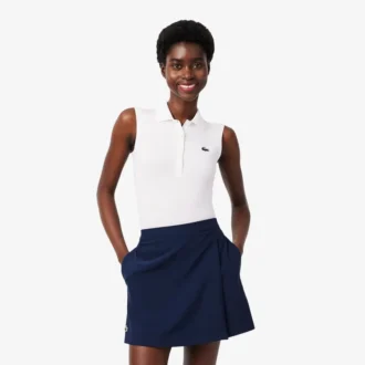 Polo de golfe feminino slim fit com proteção UV e tecido elástico