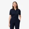 Polo de golfe feminino slim fit com proteção UV e tecido elástico