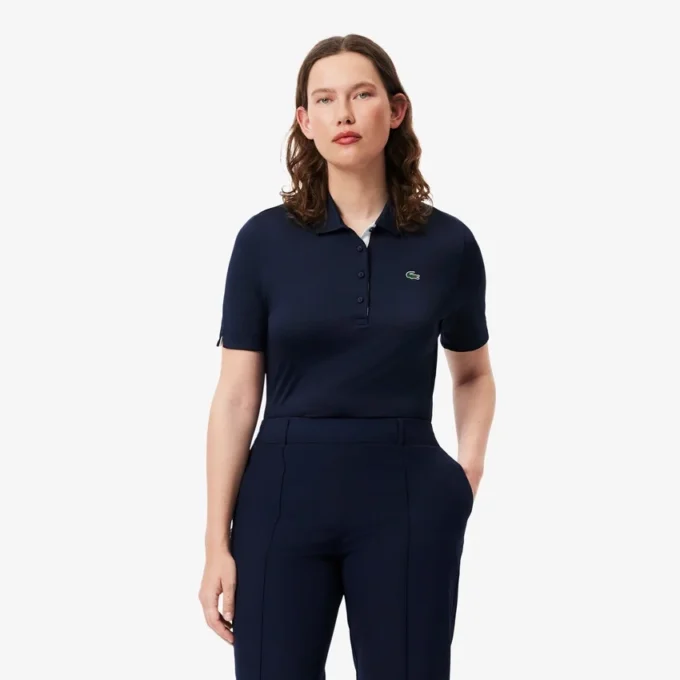 Polo de golfe feminino slim fit com proteção UV e tecido elástico
