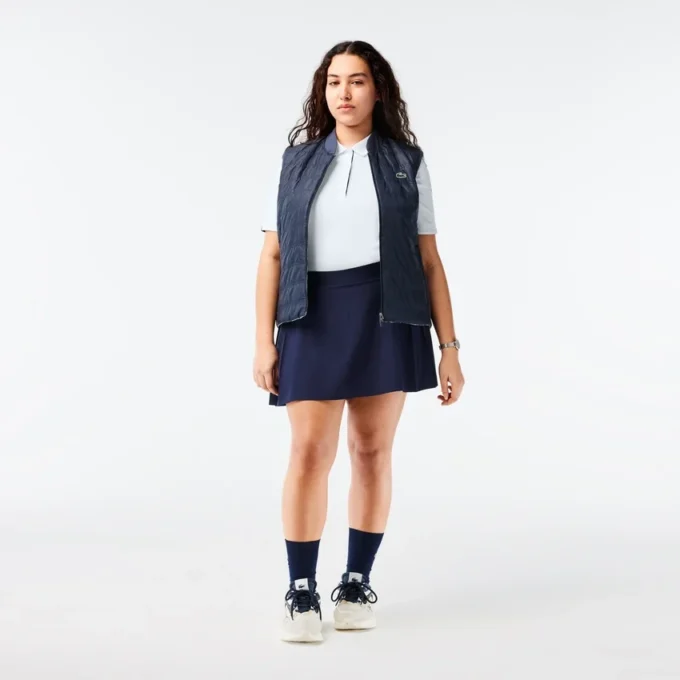 Polo de golfe feminino slim fit com proteção UV e tecido elástico