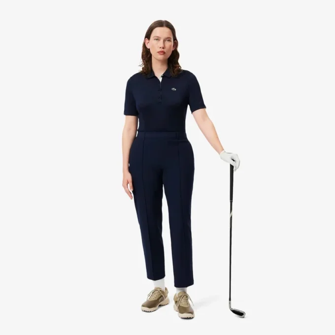 Polo de golfe feminino slim fit com proteção UV e tecido elástico