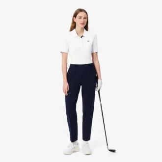 Polo de golfe feminino slim fit com proteção UV e tecido elástico