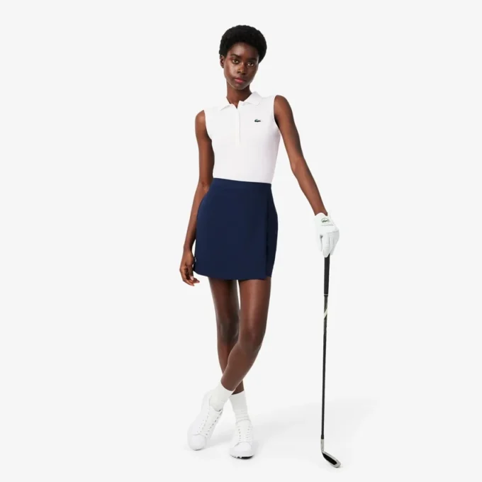 Polo de golfe feminino slim fit com proteção UV e tecido elástico