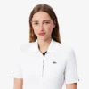 Polo de golfe feminino slim fit com proteção UV e tecido elástico