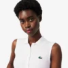 Polo de golfe feminino slim fit com proteção UV e tecido elástico