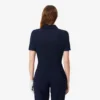 Polo de golfe feminino slim fit com proteção UV e tecido elástico